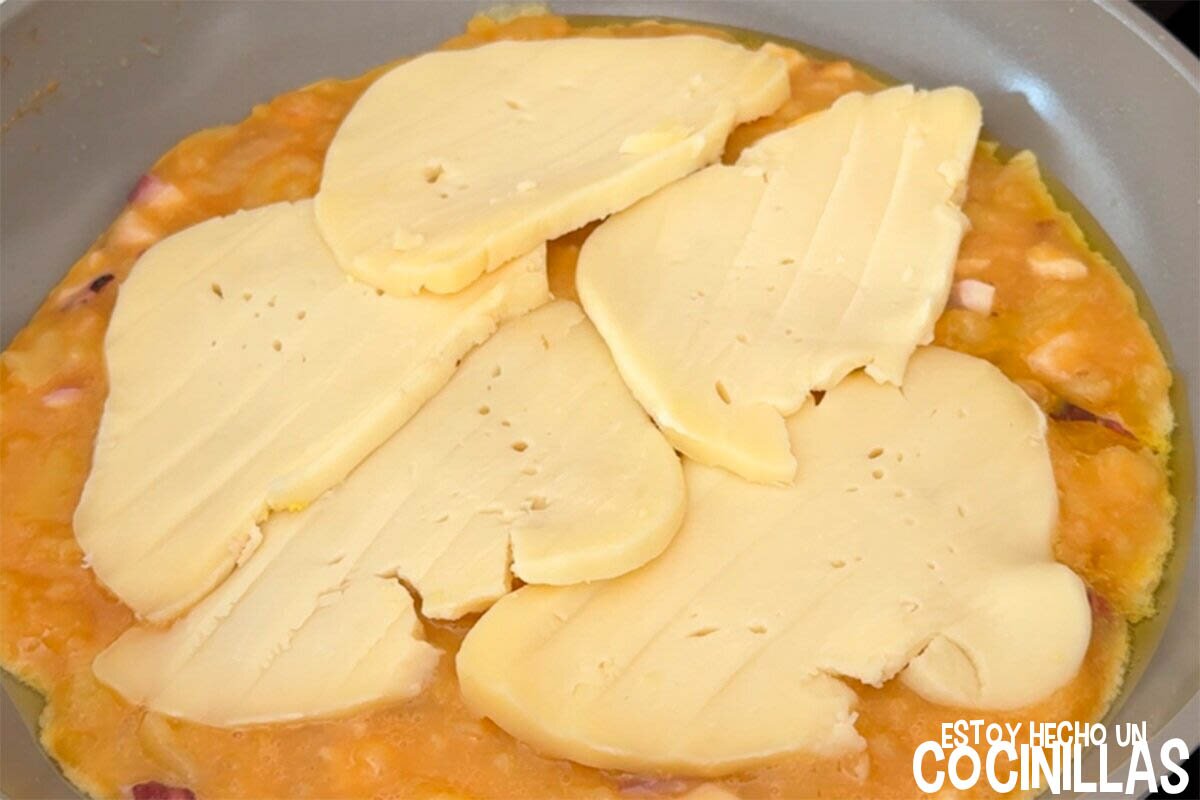 Poner el queso en el medio